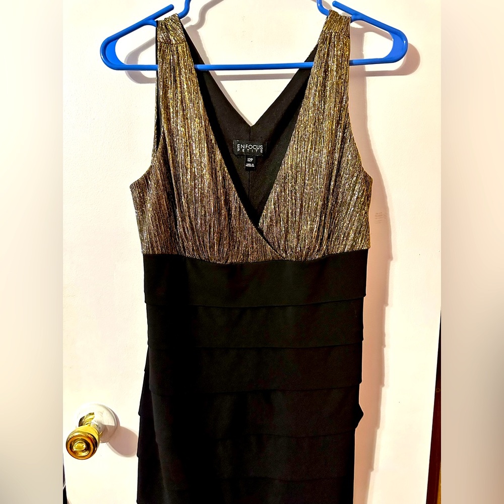 Gorgeous body forming mini dress. It is absolutely stunning!!